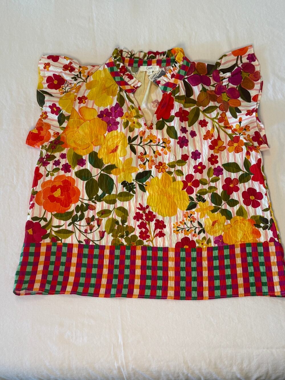 Oddi Brand NWT beautiful fall colors ruffled sleeve top. Size medium.